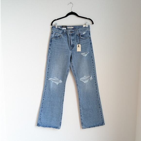 NWT Levi's Baggy Bootcut LD99 Distressed Blue Denim Mid-rise Jeans, size 26 L33 - Picture 1 of 9